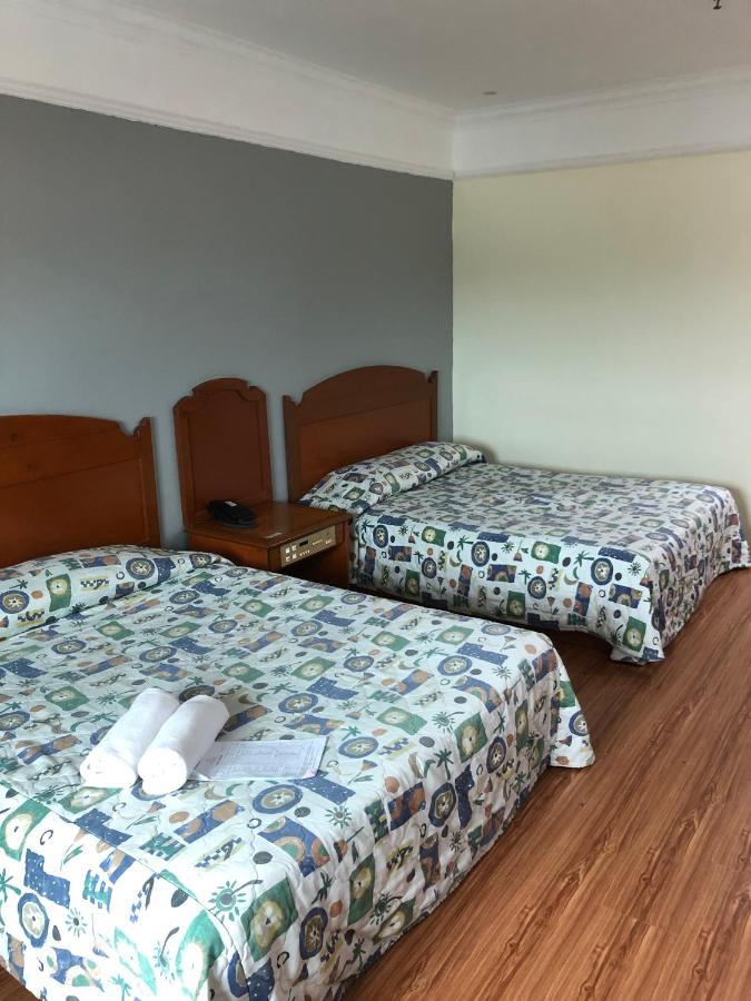 Purnama Hotel Limbang Kültér fotó