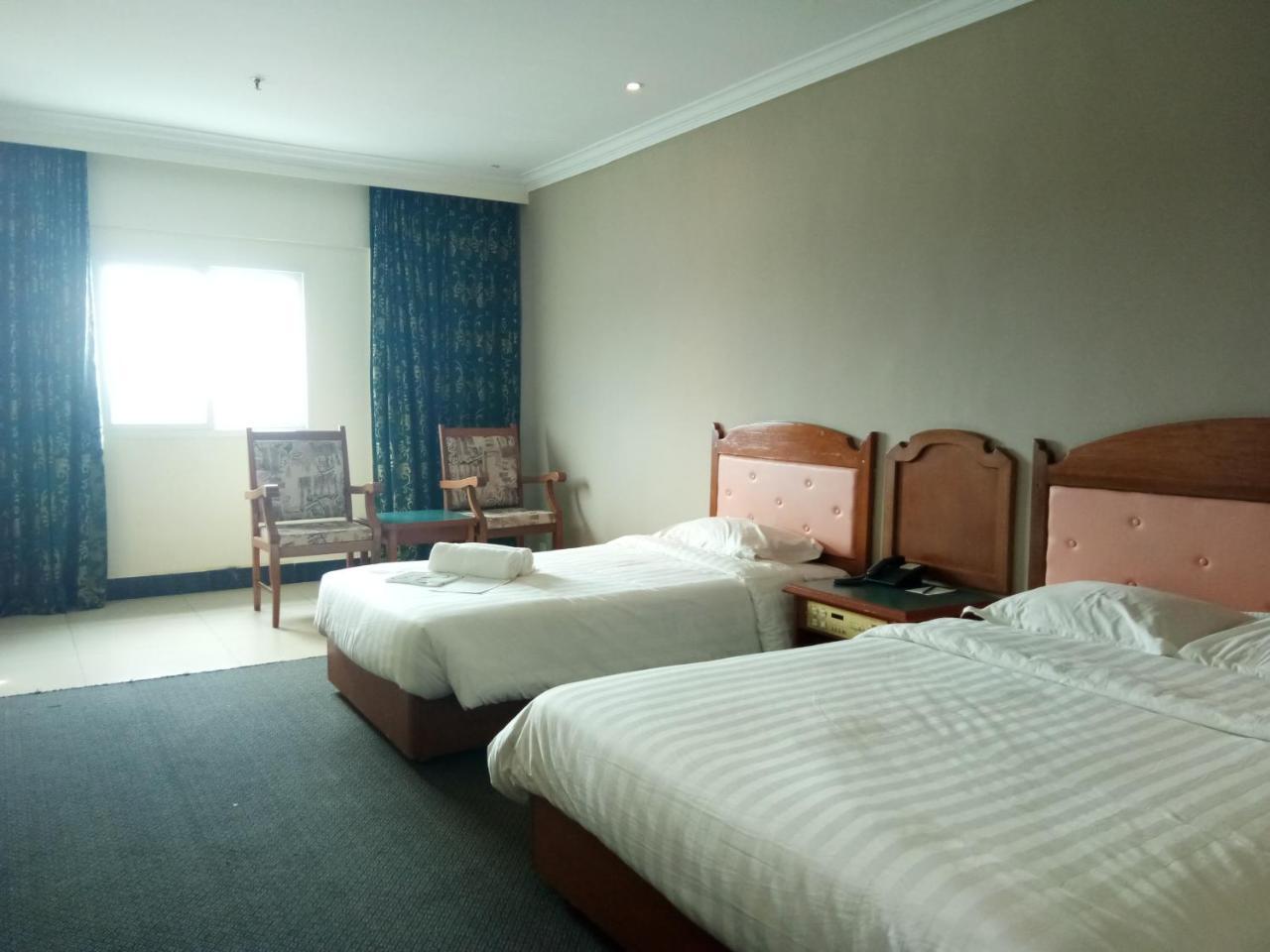 Purnama Hotel Limbang Kültér fotó