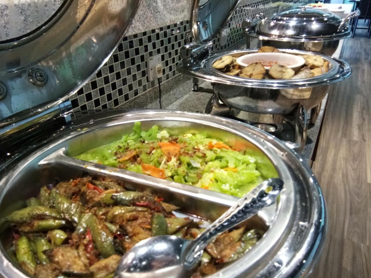Purnama Hotel Limbang Kültér fotó