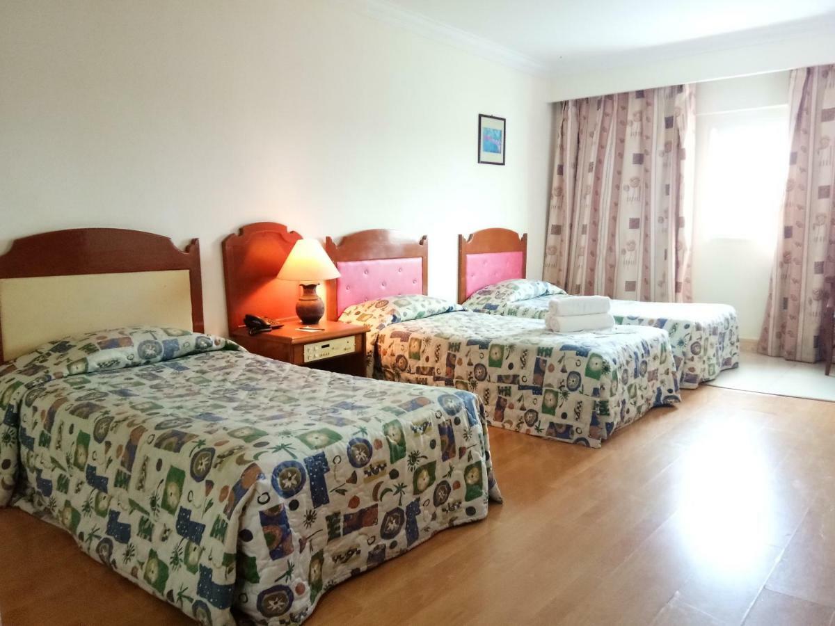 Purnama Hotel Limbang Kültér fotó